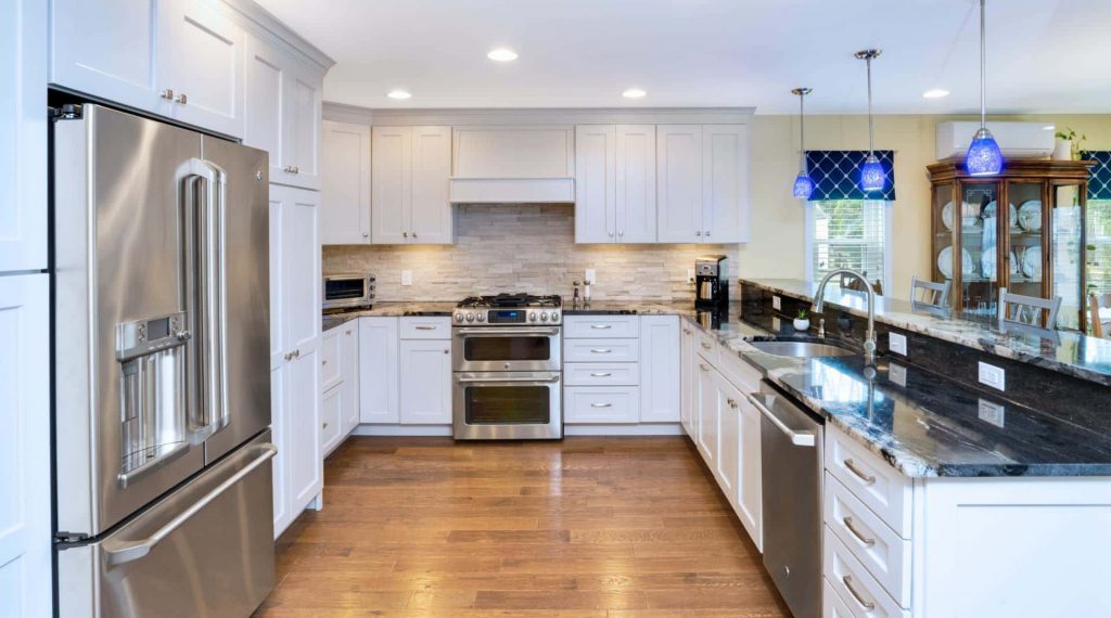 Kitchen designed by Main Line Kitchen Design in Havertown, PA featuring a two-level peninsula