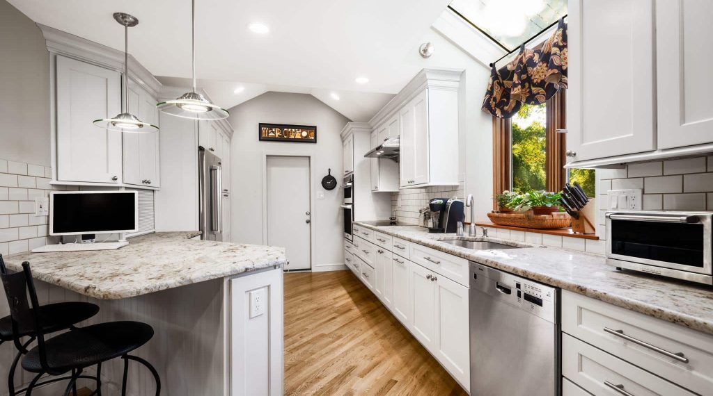 Neutral kitchen with stainless steel appliances designed by Main Line Kitchen Design in West Chester, PA.