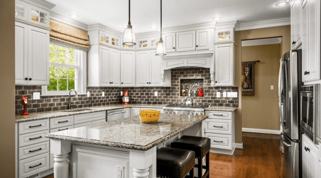 Traditional Collegeville kitchen designed with Bishop cabinetry in maple by Main Line Kitchen Design