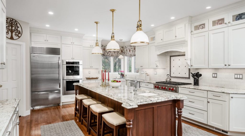 Kitchen designed by Main Line Kitchen Design with a cherry island located in Malvern, PA.