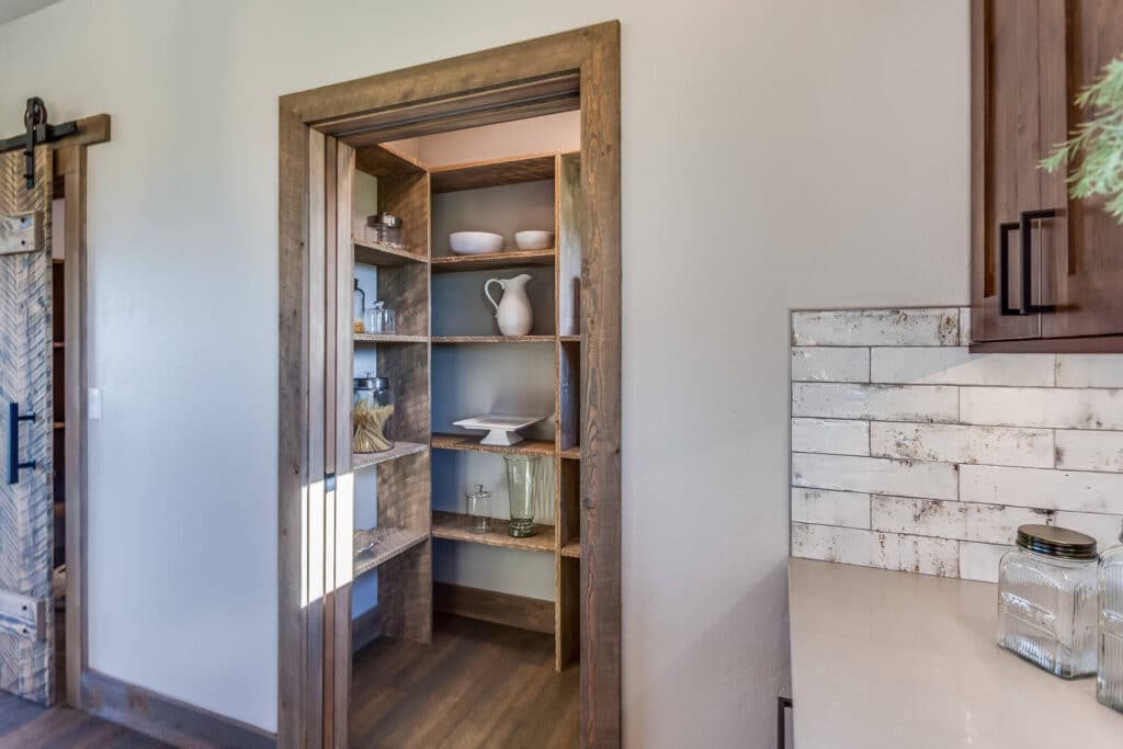 Small walk-in pantries eat us a lot of space by using most of the usable space simply walking into the pantry